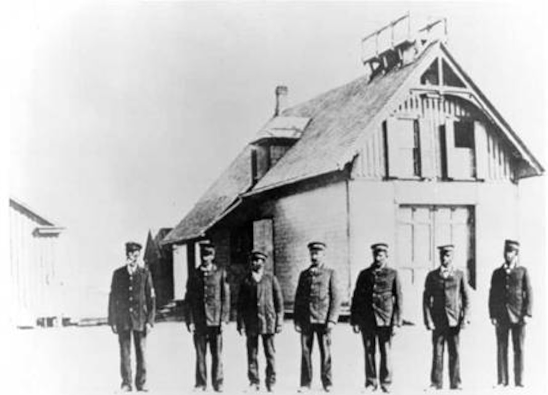 Photograph, the crew of the Pea Island Life-Saving Station, circa 1890s. Keeper Richard Etheridge is on the left.
Coast Guard Archives