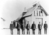 Photograph, the crew of the Pea Island Life-Saving Station, circa 1890s. Keeper Richard Etheridge is on the left.
Coast Guard Archives