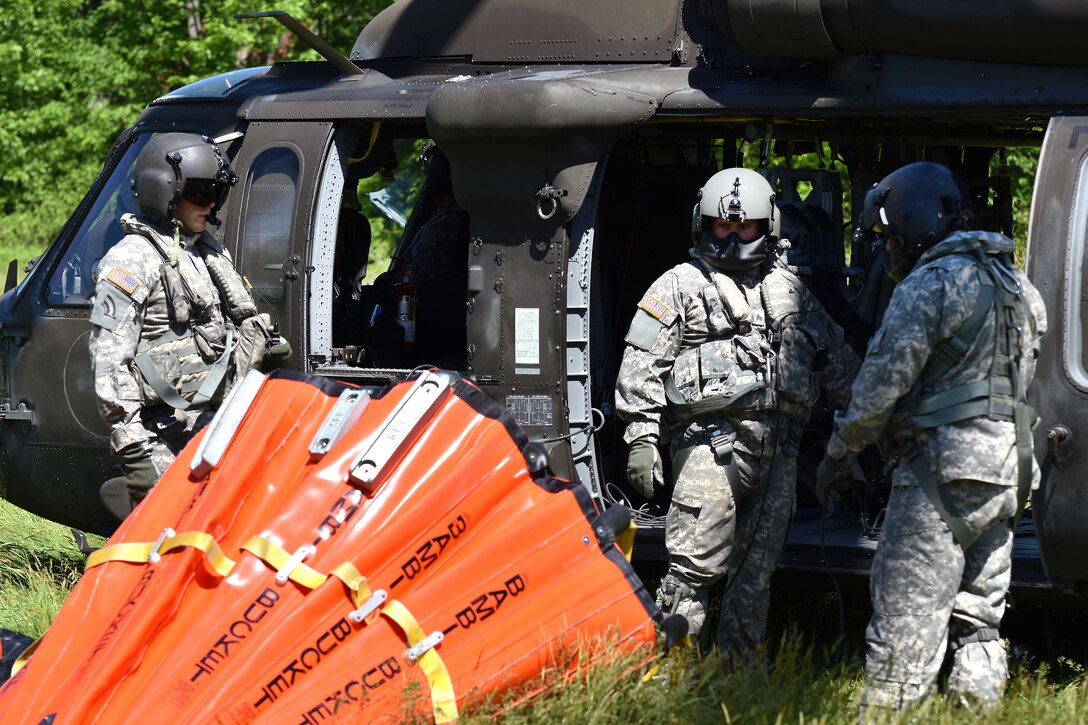 New York Army National Guardsmen prepare a bucket firefighting system before participating in training near Round Lake, N.Y., May 31, 2017. The training prepares the guardsmen to extinguish forest fires and other emergencies. Army National Guard photo by Pfc. Andrew Valenza