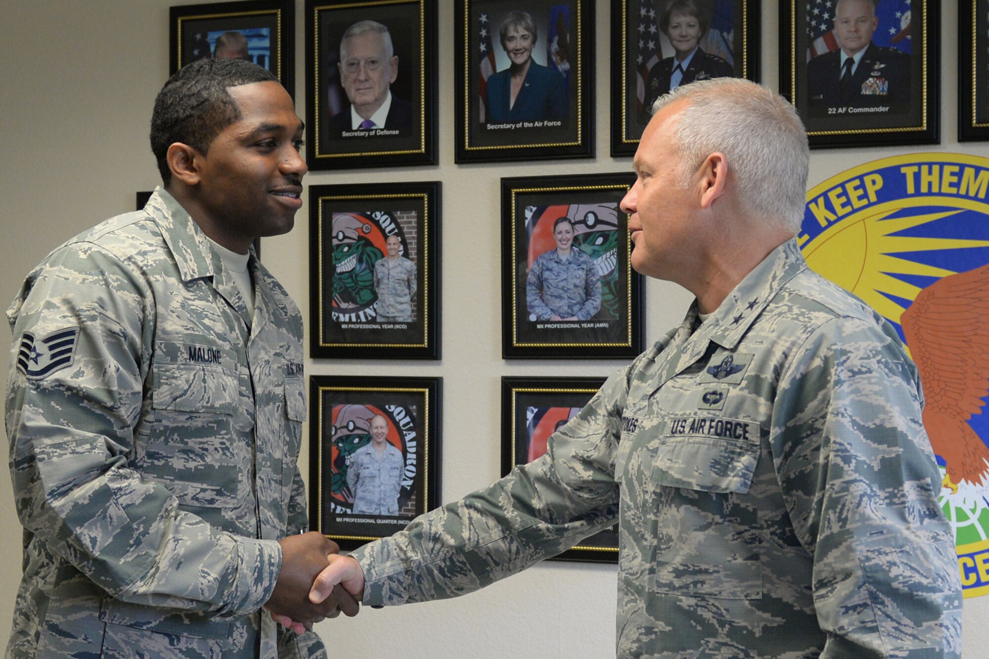 U.S. Air Force Maj. Gen. John P. Stokes, commander, 22nd Air Force, meets Staff Sgt. Corey Malone, a maintenance management production journeymen assigned to the 913th Maintenance Squadron during the general’s visit to Little Rock Air Force Base, Ark., June 3, 2017. Stokes toured the Group’s facilities and met with many of the Airmen, while here to preside over the 913th Airlift Group’s Assumption of Command Ceremony. (U.S. Air Force photo by Airman 1st Class Codie Collins/Released)