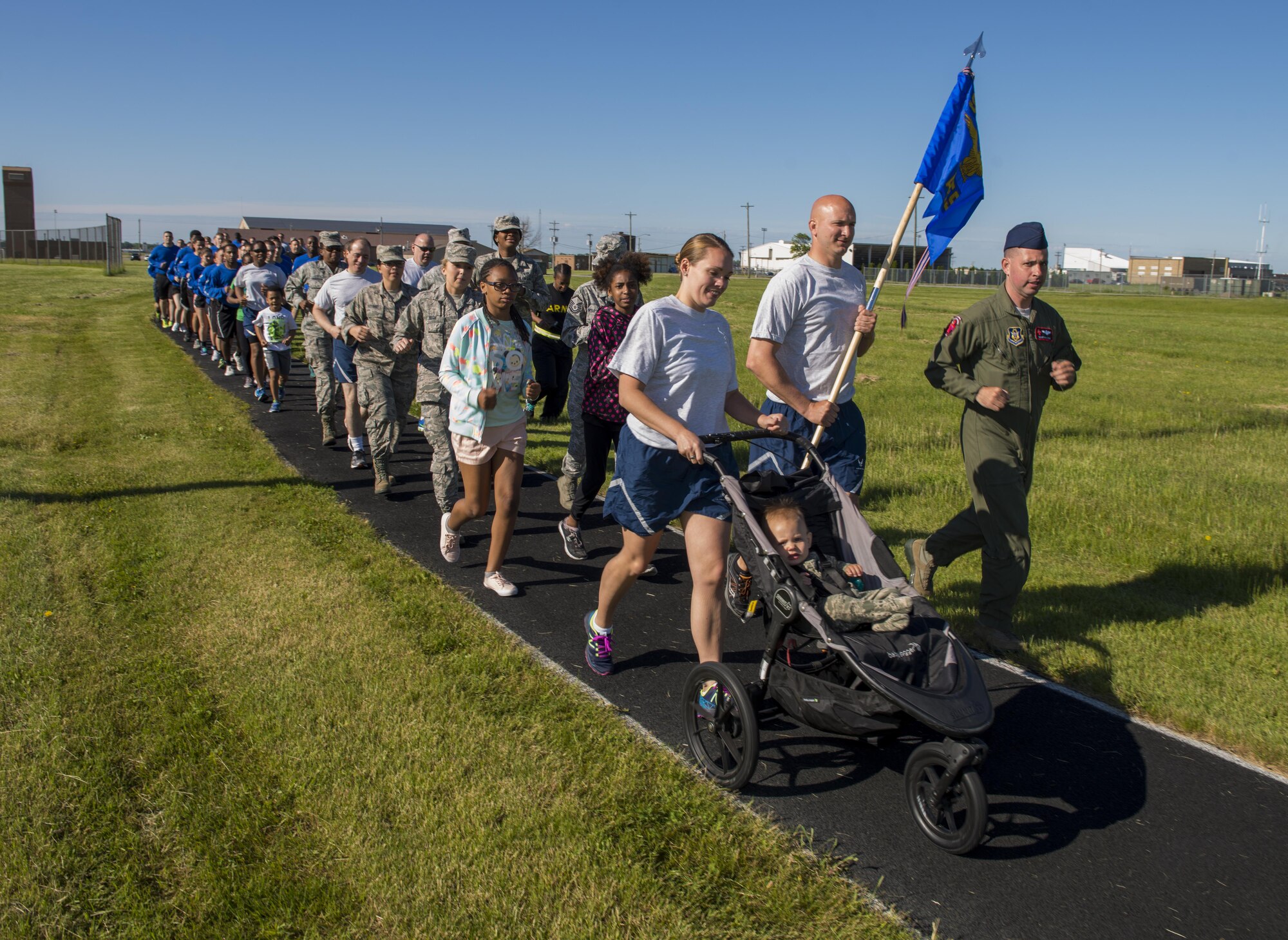 914th Air Refueling Wing Airman and Family Readiness hosts a cadence run open to all members of the base and their families. The run was the first event of a busy day which included a Mission Change Ceremony for the 914th, followed by family day, a yearly gathering for 914th personnel and their families, hosted by the wing as a thank you to the families who support service members. (U.S. Air Force photo by Tech. Sgt. Stephanie Sawyer) 

