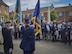 2nd Lt. Andrew Henderson, 36th Electronic Warfare Squadron EW engineer, holds the 36th Bombardment Squadron heritage flag during a wreath-laying ceremony at Foulsham Memorial on May 12, 2017. Henderson, along with four additional 36th EWS members, represented the unit at various memorials, dinners, luncheons, teas and wreath-laying ceremonies during the 20th Annual Royal Air Force 100 Group Association Reunion. (Courtesy Photo)