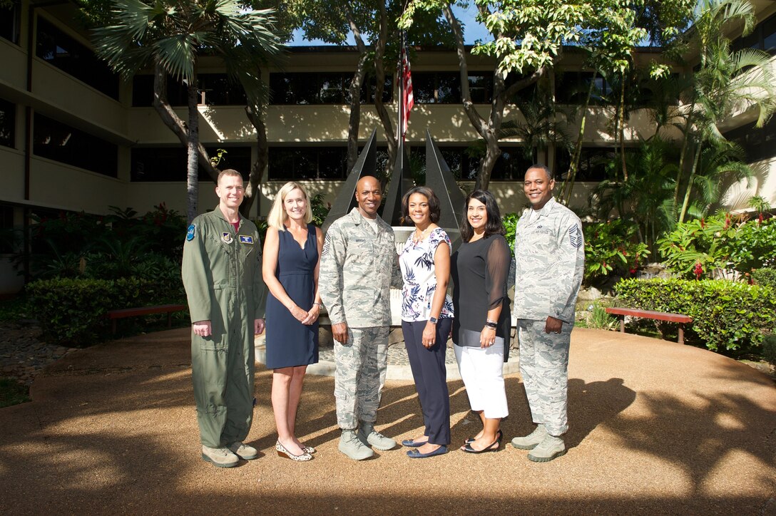 Chief Master Sgt. of the Air Force Kaleth O. Wright (center) and his wife Tonya, pose for a group photo with Pacific Air Forces (PACAF) leadership during their tour of Headquarters PACAF on Joint Base Pearl Harbor-Hickam, Hawaii, June 2, 2017. The visit is an opportunity for Wright to interact with PACAF Airmen, receive mission briefs and views on key issues across the PACAF area of responsibility. (U.S. Air Force photo/Tech. Sgt. Kamaile Chan)