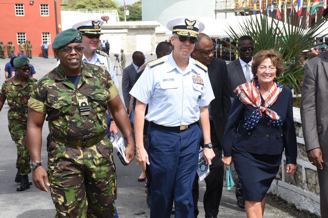 Coast Guard Rear Adm. Daniel Abel, director of operations for U.S. Southern Command, and Linda Swartz Taglialatela, ambassador for the United States of America, depart the opening ceremony for Tradewinds 2017 in Bridgetown, Barbados, June 6, 2017.  Tradewinds is a joint, combined exercise conducted in conjunction with partner nations to enhance the collective abilities of defense forces and constabularies to counter transnational organized crime, and to conduct humanitarian/disaster relief operations. (U.S. Coast Guard photo by Petty Officer 1st Class Melissa Leake/Released)