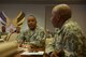 U.S. Air Force Chief Master Sgt. Anthony W. Johnson (left), Command Chief Master Sergeant of Pacific Air Forces (PACAF), speaks with Chief Master Sgt. of the Air Force Kaleth O. Wright during a mission brief at Headquarters Pacific Air Forces on Joint Base Pearl Harbor-Hickam, Hawaii, June 2, 2017. The visit is an opportunity for Wright to interact with PACAF Airmen, receive mission briefs and views on key issues across the PACAF area of responsibility. (U.S. Air Force photo/Tech. Sgt. Kamaile Chan)