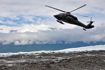 An Alaska Army National Guard UH-60 Black Hawk helicopter lands on top of Colony Glacier near Anchorage, Alaska to pick up personnel as part of Operation Colony Glacier. The operation is a mission to recover human remains and remove debris from a 1952 crash of a U.S. Air Force C-124 Globemaster II on the glacier with 52 service members on board. The recovery effort has taken place every summer since 2012 by personnel from Alaskan Command, the Alaska National Guard, Air Force Mortuary Affairs Operations, U.S. Army Alaska, 673d Air Base Wing, 3d Wing and Detachment 1, 66 Training Squadron.