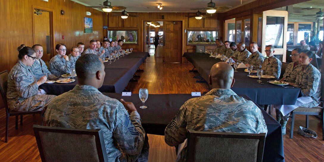 Chief Master Sgt. of the Air Force Kaleth O. Wright answers questions from Airmen assigned to Headquarters Pacific Air Forces (PACAF) during a luncheon at Joint Base Pearl Harbor-Hickam, Hawaii, June 2, 2017. Wright was accompanied by Chief Master Sgt. Anthony W. Johnson, PACAF command chief, and made several stops to units across the base, providing an opportunity for Airmen to interact with him and discuss their concerns. (U.S. Air Force photo/Tech. Sgt. Kamaile Chan)