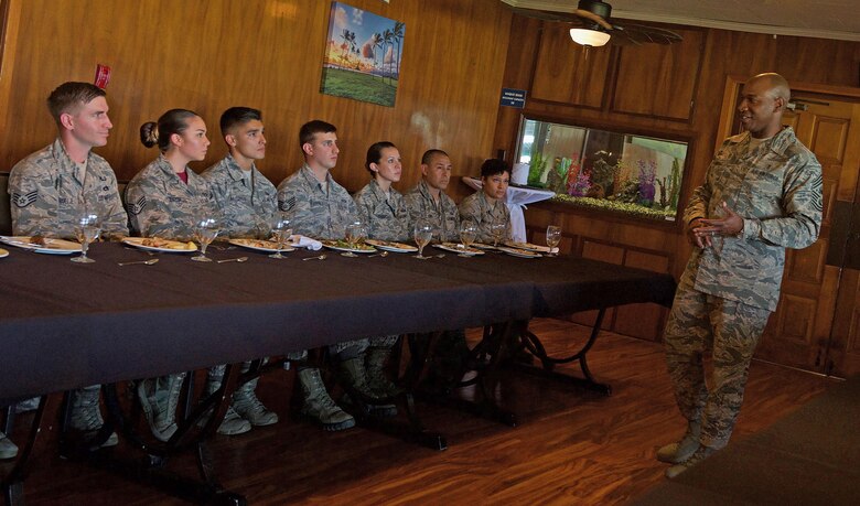 Chief Master Sgt. of the Air Force Kaleth O. Wright answers questions from Airmen assigned to Headquarters Pacific Air Forces (PACAF) during a luncheon at Joint Base Pearl Harbor-Hickam, Hawaii, June 2, 2017. Wright was accompanied by Chief Master Sgt. Anthony W. Johnson, PACAF command chief, and made several stops to units across the base, providing an opportunity for Airmen to interact with him and discuss their concerns. (U.S. Air Force photo/Tech. Sgt. Kamaile Chan)