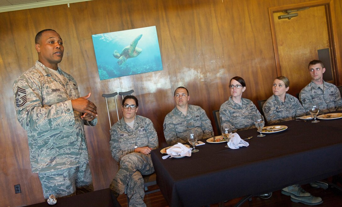U.S. Air Force Chief Master Sgt. Anthony W. Johnson, Pacific Air Forces (PACAF) command chief speaks with Airmen during a luncheon at Joint Base Pearl Harbor-Hickam, Hawaii, June 2, 2017. Johnson accompanied Chief Master Sgt. of the Air Force Kaleth O. Wright during his visit to PACAF where they made several stops to units across the base, providing an opportunity for Airmen to interact with him and discuss their concerns.  (U.S. Air Force photo/Tech. Sgt. Kamaile Chan)