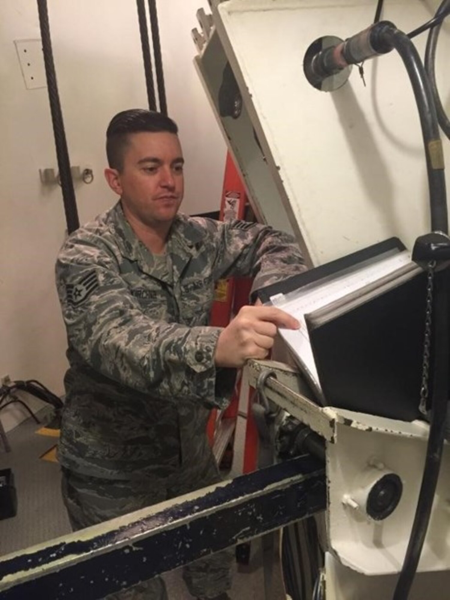 Staff Sgt. Geoffrey Kirchner, 90th Missile Maintenance Squadron team chief, performs work at a training facility at F.E. Warren Air Force Base, Wyo. (U.S. Air Force courtesy photo) 