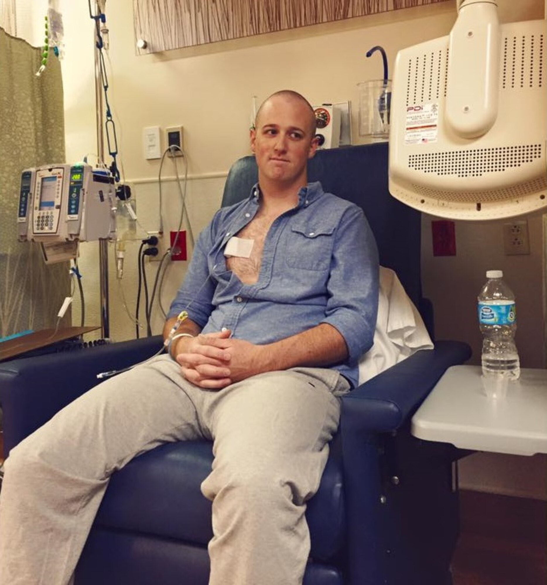 U.S. Air Force Staff Sgt. Oliver Broadbent, 22nd Airlift Squadron loadmaster, undergoes chemotherapy treatment in David Grant USAF Medical Center at Travis Air Force Base, Calif. Broadbent was diagnosed with stage 1 Follicular non-Hodgkin lymphoma in June 2015. After six months of chemotherapy and radiation treatment, Broadbent was pronounced cancer free. (Courtesy photo)  