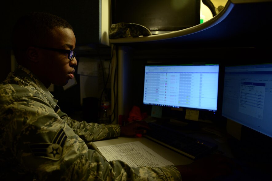 U.S. Air Force Senior Airman Tony Hinton, 58th Airlift Squadron Aviation Recourse Management journeyman, checks Airmen qualifications for in-flight training, June 1, 2017, at Altus Air Force Base, Oklahoma. The SARM office is in charge of approving the accuracy of flight scheduled personnel and documenting their flight records.