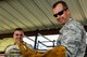 Col. Ty. Neuman, 2nd Bomb Wing commander, holds a snake at the 2nd Civil Engineer Squadron Pest Management office on Barksdale Air Force Base, La., May 24, 2017. The rat snake is used to show what kind of snakes are in the local area to visitors of the base and base residents. (U.S. Air Force photo/Airman 1st Class Sydney Bennett)