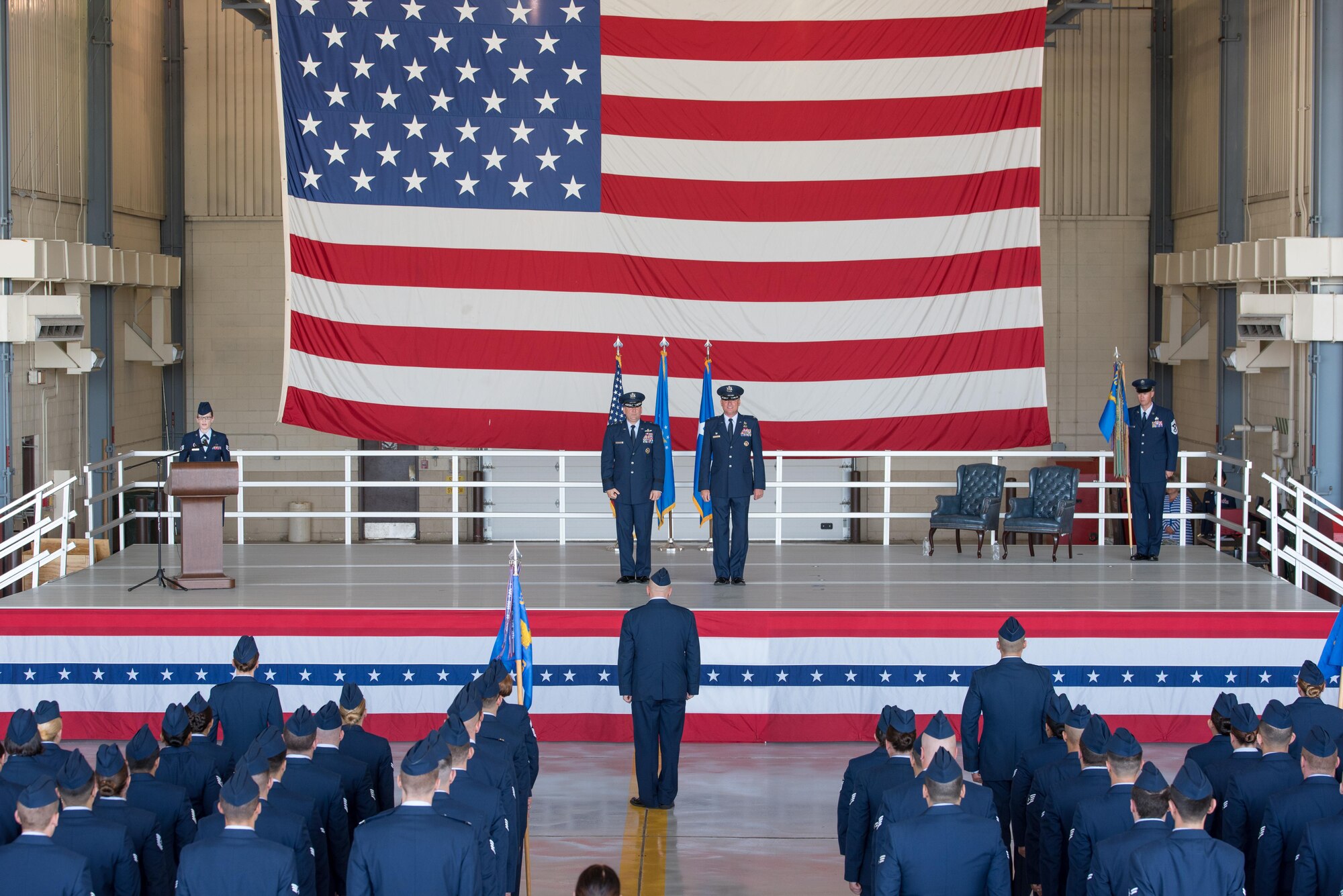 Maj. Gen. Christopher Bence, the United States Air Force Expeditionary Center commander, left, presents Col. Benjamin Spencer, right, to the members of the 319th Air Base Wing as their new wing commander during an Assumption of Command ceremony held June 6, 2017, at Grand Forks AFB, N.D. This will be Spencer’s first wing-level command experience. (U.S. Air Force photo by Master Sgt. Eric Amidon)