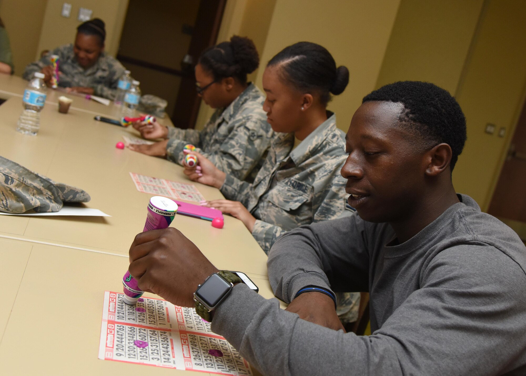 Senior Airman Tradarius Christian, 81st Security Forces Squadron control officer, plays a game of BINGO during the Keesler Summer Bash at the Bay Breeze Event Center June 1, 2017, on Keesler Air Force Base, Miss. The bash consisted of demonstrations by the 338th Training Squadron drill team and the 81st SFS military working dogs, games and free food. (U.S. Air Force photo by Kemberly Groue)