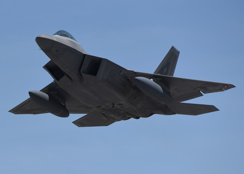 A 95th Fighter Squadron F-22 Raptor flies the Panama City, Fla., skies May 10, 2017. As part of the Maintainer for a day program, Airmen selected to participate will have the opportunity to work on an F-22 and help the mission to project unrivaled combat airpower. (U.S. Air Force photo by Senior Airman Sergio A. Gamboa/Released)