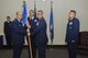 U.S. Air Force Maj. Pedro Jimenez, 17th Security Forces Squadron Commander, passes the unit guideon to Col. Christopher Harris, 17th Mission Support Group Commander, during the 17th SFS Change of Command ceremony at the Event Center on Goodfellow Air Force Base, Texas, June 5, 2017. The event honored Jimenez’ service and welcomed its new commander Maj. Min Lee. (U.S. Air Force photo by Airman 1st Class Chase Sousa/Released)