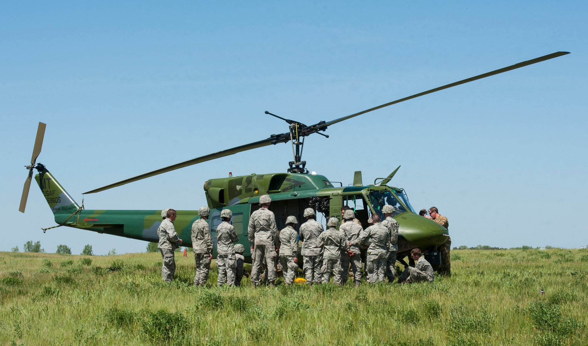 Members of the 5th Civil Engineer Squadron are briefed on hoist safety procedures at Minot Air Force Base, N.D., June 1, 2017. More than 60 CES Airmen participated in the training, which consisted of an array of deployment-type tasks. (U.S. Air Force photo/Airman 1st Class Jonathan McElderry)