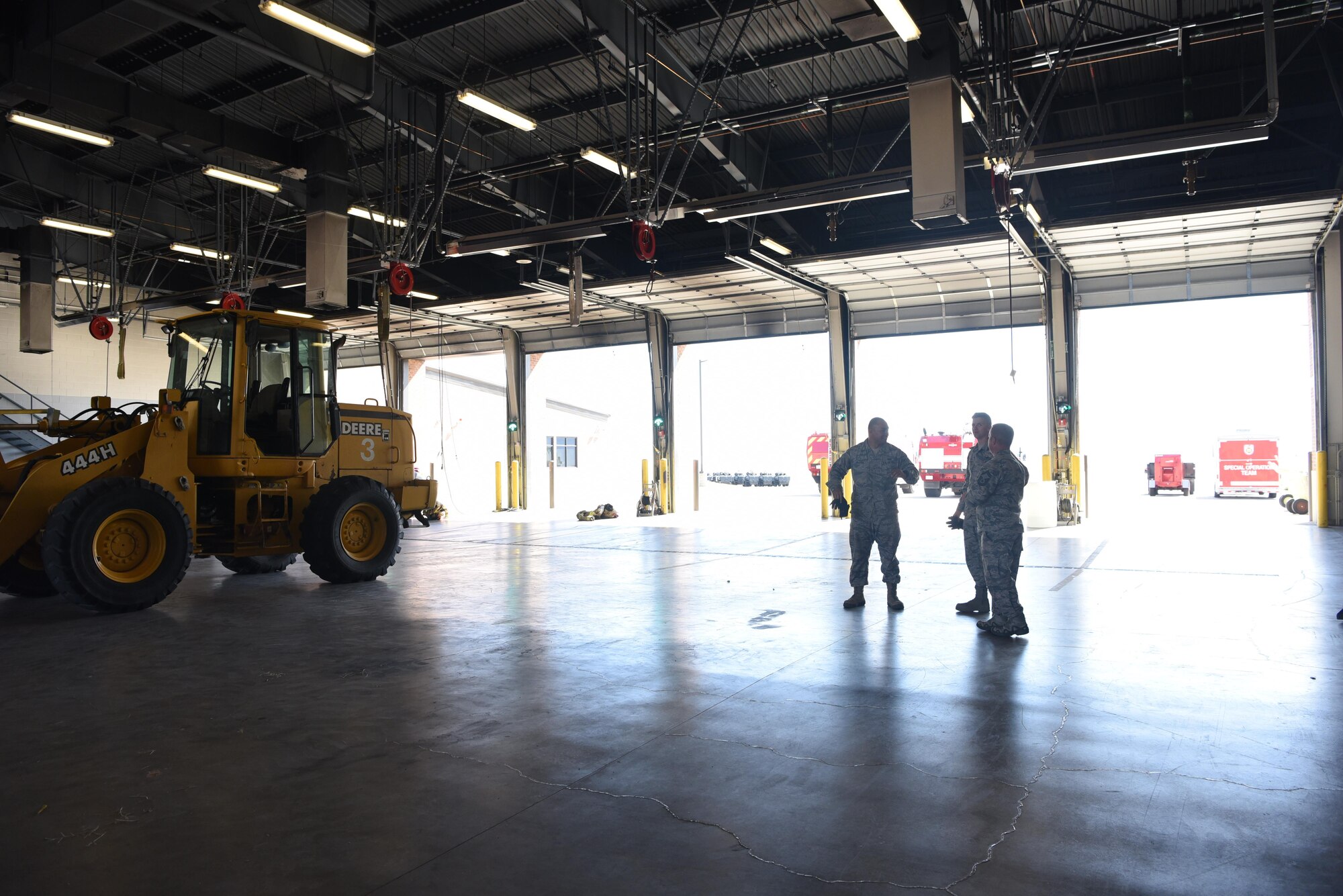 A 21st Civil Engineer Squadron Airman uses a front-end loader to load a container filled with aqueous film forming foam effluence into the back of a truck at Fire Station 1 at Peterson Air Force Base, Colo., April 19, 2017 so it can be transported to an off base contractor for disposal. The legacy AFFF from aircraft rescue firefighting vehicles was replaced with a newer formulated product containing significantly fewer perfluorooctanioc and perfluorooctanesulfonic acids , which are suspected of contaminating groundwater supplies in communities around the world where legacy AFFF was used. (U.S. Air Force photo by Steve Kotecki)