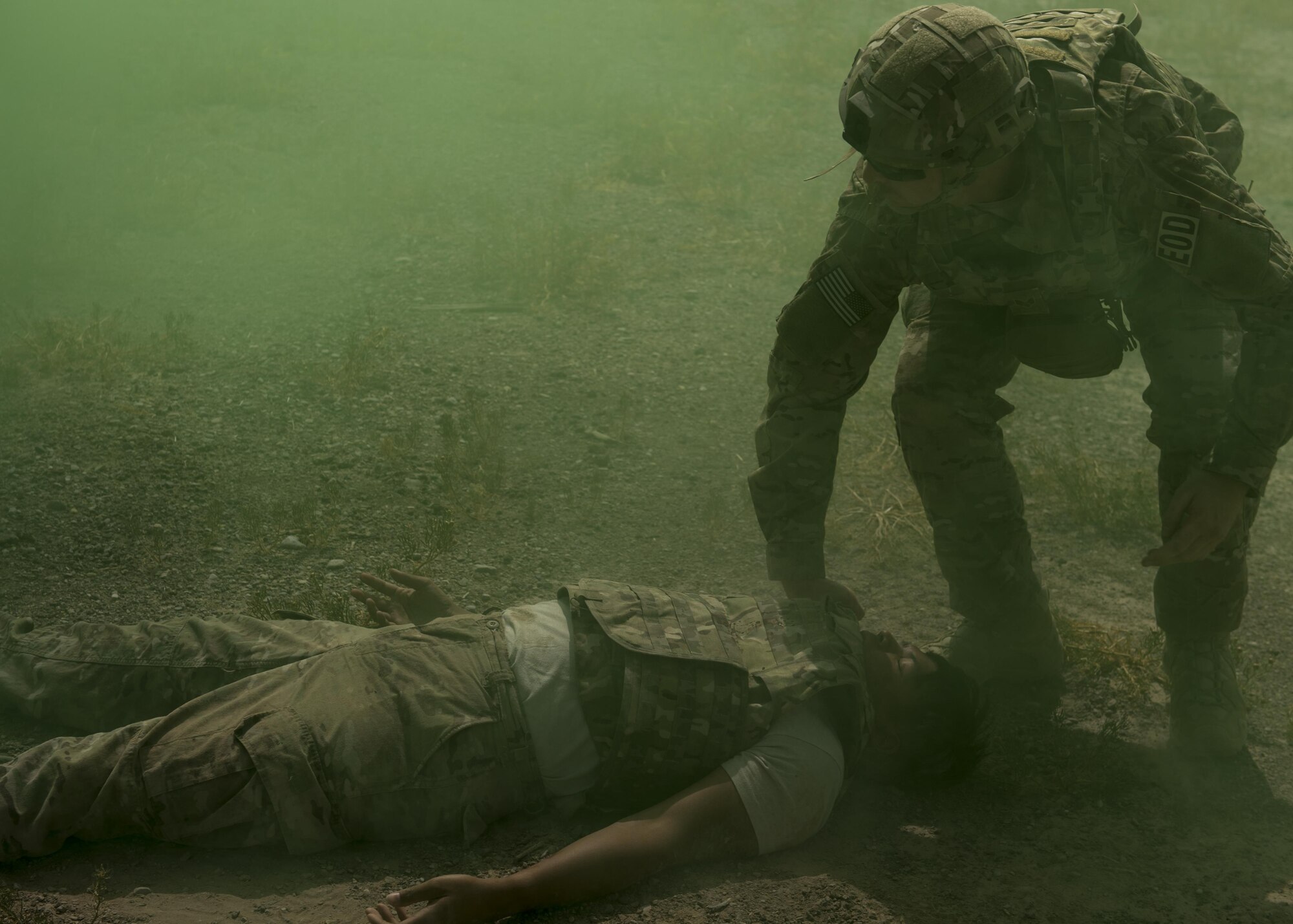 An Explosive Ordnance Disposal Airman prepares to evacuate a simulated casualty during a Tactical Combat Casualty Care exercise at Holloman Air Force Base, N.M., on April 31, 2017. The training focuses on individual trauma, tools, techniques, and treatment procedures. The exercise also included the use of moulage, non-lethal training munitions, trained role-players, and a multitude of other artificial stressors. (U.S. Air Force Photo by Senior Airman Chase Cannon)