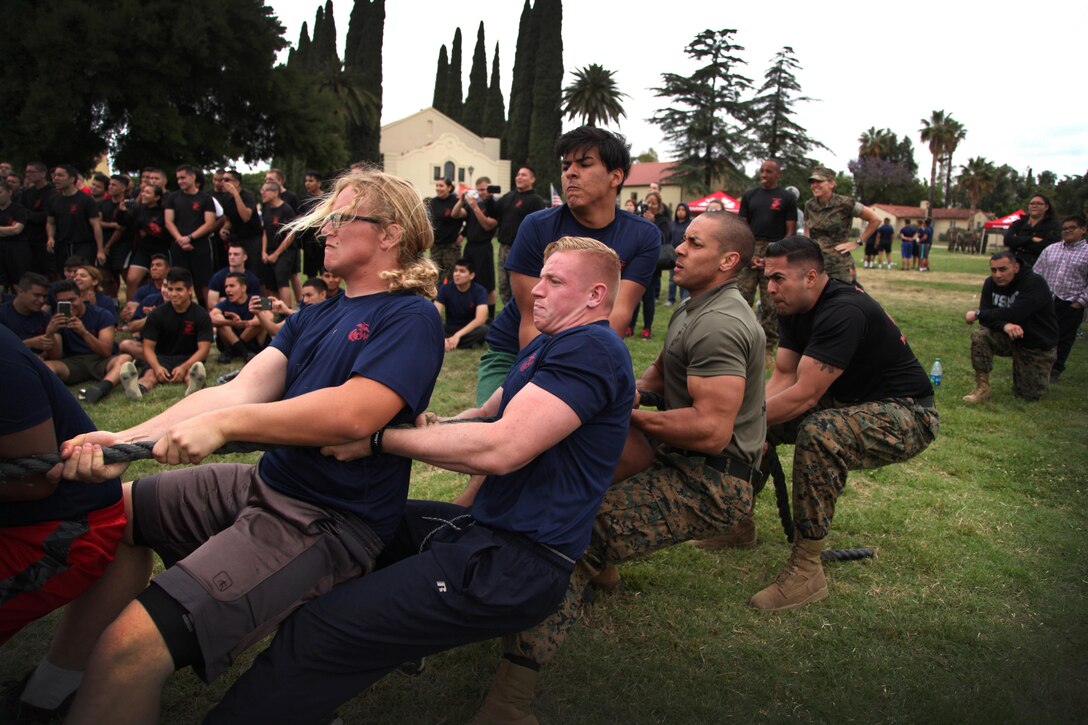 RSS Fontana participates in the tug of war competition during RS Riverside's annual pool function. 