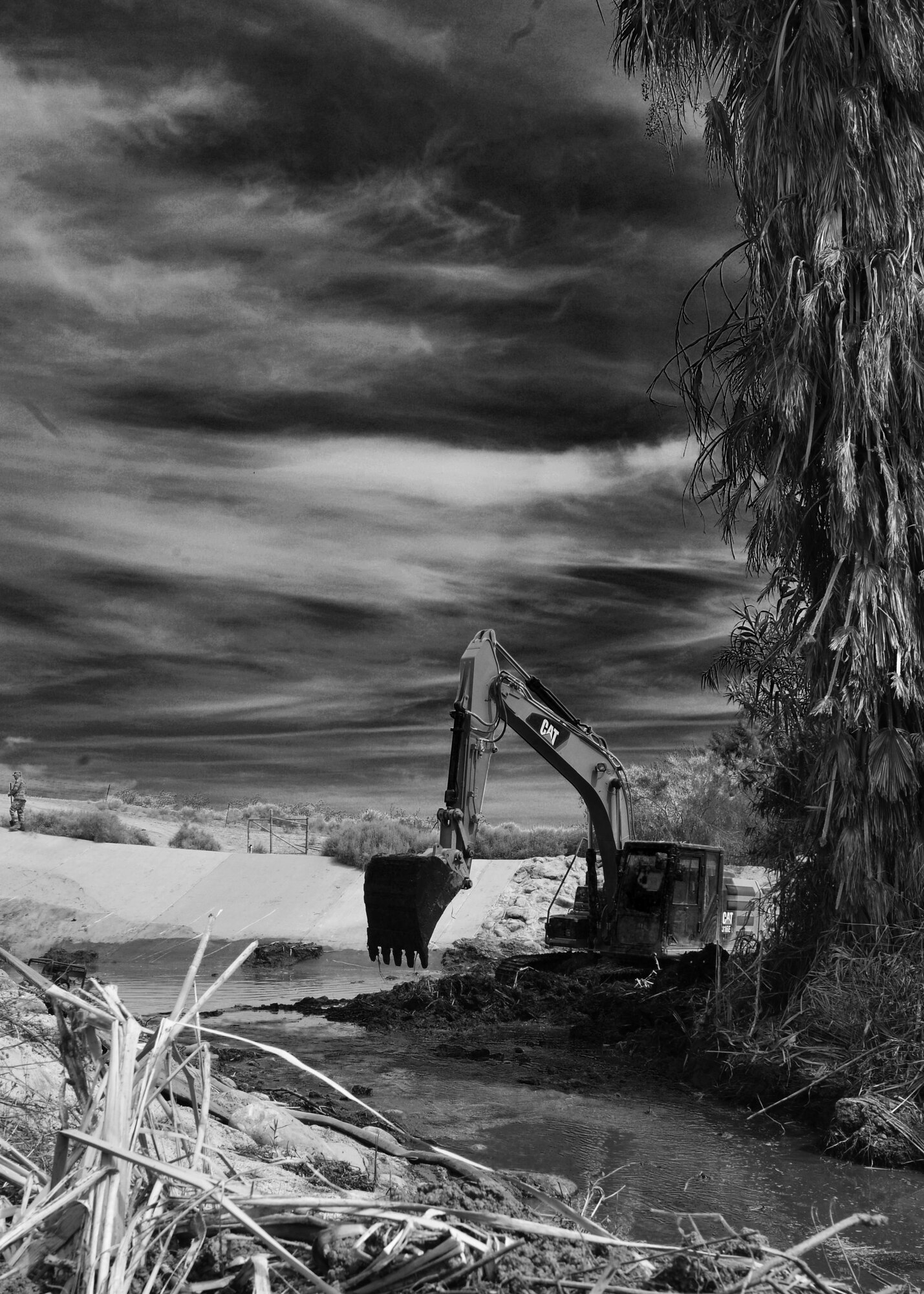An excavator works to remove sludge May 30, 2017 in Glendale, Az. Airmen from Ellsworth AFB, Fairchild AFB, Malmstrom AFB, Travis AFB, Schriever AFB, Andrews AFB and Grand Forks AFB partnered with Luke Air Force Base for the annual Bird/Wildlife Air Strike Hazard project. The program exists to deter the local bird population from nesting in the area as the birds and wildlife can pose a threat to the flying mission when planes take off and land at Luke.
(U.S. Air Force photo by Staff Sgt. Marcy Copeland)
