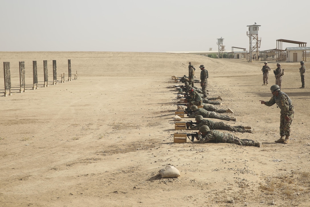 Afghan National Army soldiers with 2nd Kandak, 4th Brigade, 215th Corps fire M16A4 rifles during a battlesight zero range at Camp Shorabak, Afghanistan, June 4, 2017. The soldiers aligned their sights to ensure maximum accuracy before engaging in more advanced courses of fire. The Helmand Regional Military Training Center is instructing the unit on essential infantry skills during an eight-week operational readiness cycle with recommendations for sustainment and improvements from approximately 15 U.S. Marine advisors with Task Force Southwest. (U.S. Marine Corps photo by Sgt. Lucas Hopkins)