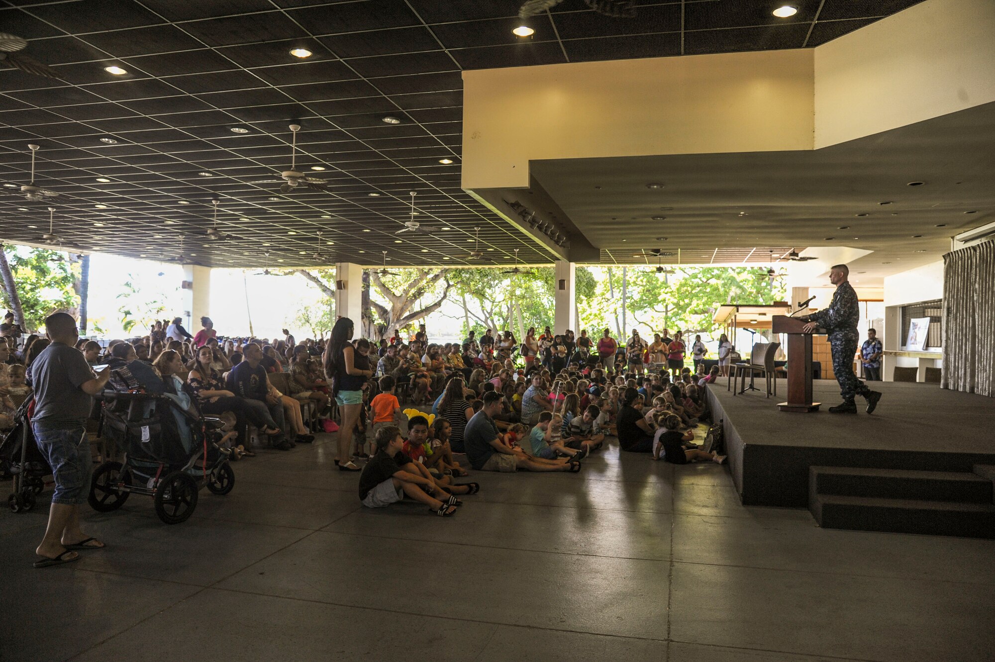 U.S. Navy Commander Corey Hurd, Joint Base Pearl Harbor-Hickam chief staff officer, speaks to the families who attended the Books on Bases event at the Hickam Officers Club, hosted by Blue Star Families, Joint Base Pearl Harbor-Hickam, Hawaii, June 2, 2017.  Blue Star Families program donates books to military children, base libraries, Department of Defense schools, and military-impacted public schools and libraries across the world. (U.S. Air Force photo by Tech. Sgt. Heather Redman)