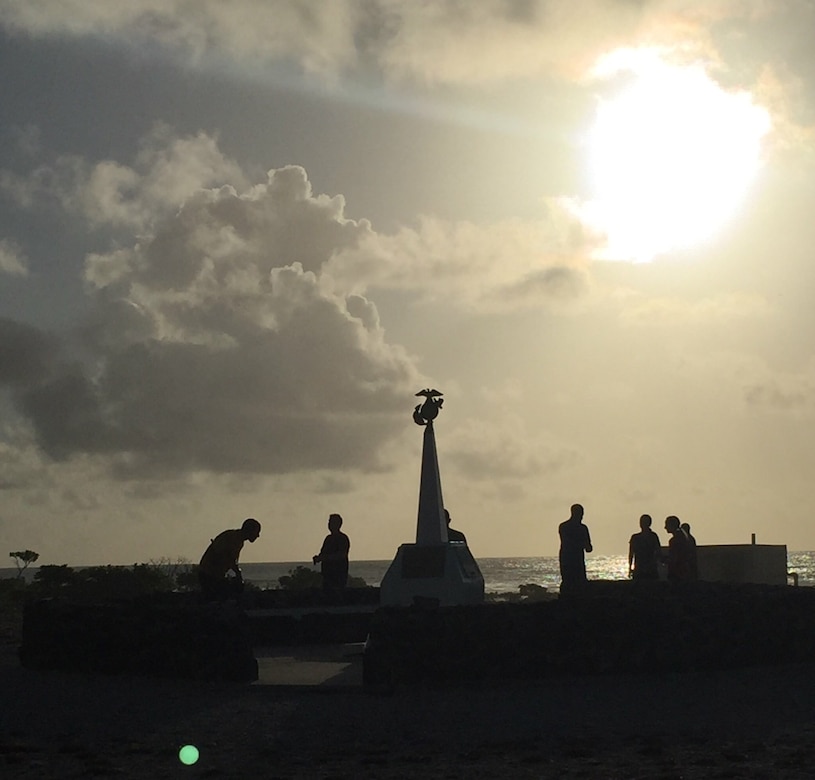 Marine Corps Gen. Joe Dunford, the chairman of the Joint Chiefs of Staff, and his staff examine the Wake Island Defenders Memorial, June 7, 2017. DoD photo by Jim Garamone