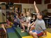 Pre-kindergarten students raise their hands to answer a question June 6, 2017, during a career day presentation at Oliver Beach Elementary School, Chase, Md. The students were listening to a presentation by a service member from the 175th Wing whose daughter was a part of the class. (U.S. Air National Guard photo by Airman Sarah M. McClanahan /Released)