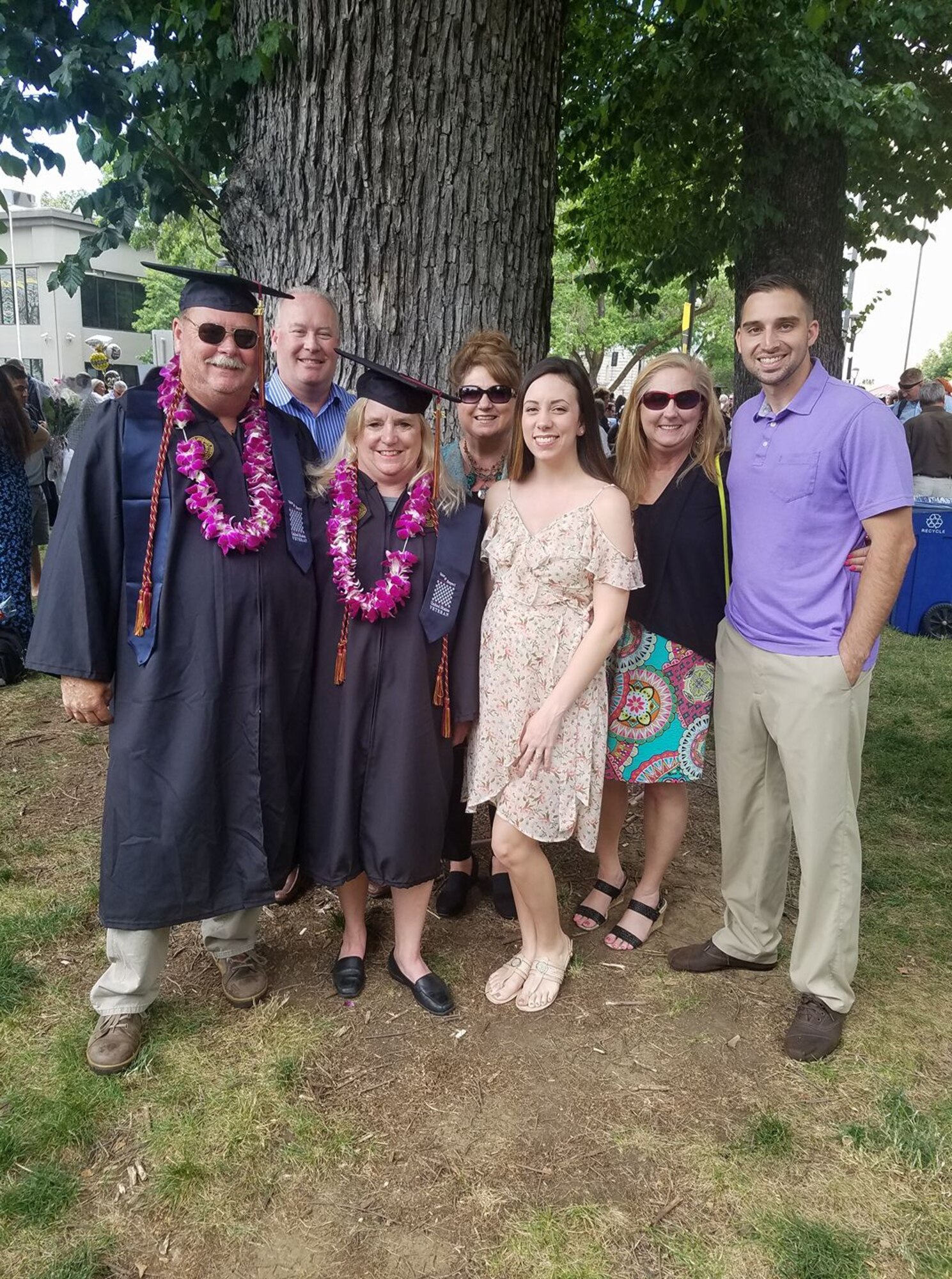 Kevin Edwards, 60th Aerial Port Squadron, and Debbie Edwards, stand with family after graduating from Brandman University in Sacramento, June 3, 2017. The couple decided to go back to school in October 2014 and completed their Bachelor of Arts degrees in business administration with honors. (Courtesy photo)