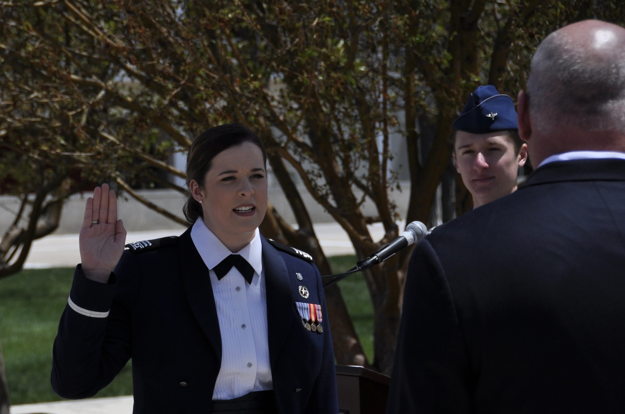 Cadet (now 2nd Lt.) Krista Kelly takes her oath of office during a commissioning ceremony May 23, 2017 at the U.S. Air Force Academy. Kelly's next assignment will be at Travis Air Force Base, Calif. (U.S. Air Force photo/Daniel Butterfield)
