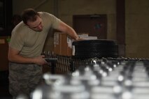 Airman 1st Class Landon Bridges, 2nd Logistics Readiness Squadron Traffic Management Office receiving technician, scans inbound shipments into the Cargo Movement Operations System at Barksdale Air Force Base, La., June 6, 2017. It is receiving technician’s job to identify what has been received and where it is supposed to end up. (U.S. Air Force photo/Airman 1st Class Stuart Bright)
