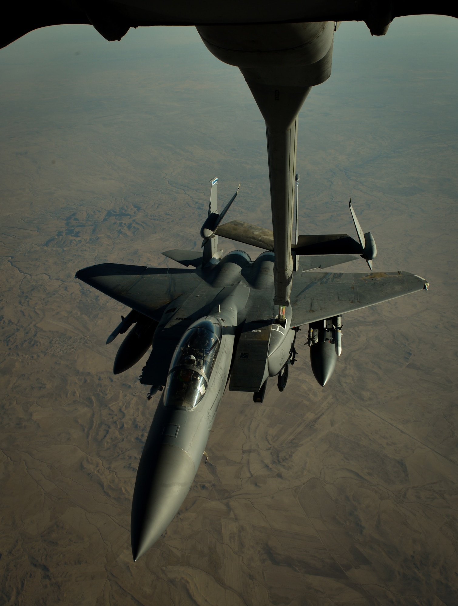 A U.S. Air Force F-15E Strike Eagle receives fuel from a 908th Expeditionary Air Refueling Squadron KC-10 Extender during a flight in support of Operation Inherent Resolve June 2, 2017. The F-15E Strike Eagle is a dual-role fighter designed to perform air-to-air and air-to-ground missions. An array of avionics and electronics systems gives the F-15E the capability to fight at low altitude, day or night, and in all weather. (U.S. Air Force photo by Staff Sgt. Michael Battles)