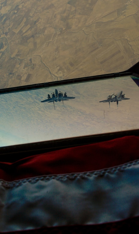 Two U.S. Air Force F-15E Strike Eagles fly in formation after receiving fuel from a 908th Expeditionary Air Refueling Squadron KC-10 Extender during a flight in support of Operation Inherent Resolve June 2, 2017. The F-15E Strike Eagle is a dual-role fighter designed to perform air-to-air and air-to-ground missions. An array of avionics and electronics systems gives the F-15E the capability to fight at low altitude, day or night, and in all weather. (U.S. Air Force photo by Staff Sgt. Michael Battles)