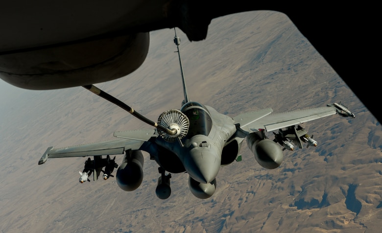 A French Naval Rafale receives fuel from a 908th Expeditionary Air Refueling Squadron KC-10 Extender during a flight in support of Operation Inherent Resolve June 2, 2017. Rafale is a French twin-engine, canard delta wing, multirole fighter aircraft with a wide range of weapons. The Rafale is intended to perform air supremacy, interdiction, aerial reconnaissance, ground support, in-depth strike and anti-ship strike missions. (U.S. Air Force photo by Staff Sgt. Michael Battles)