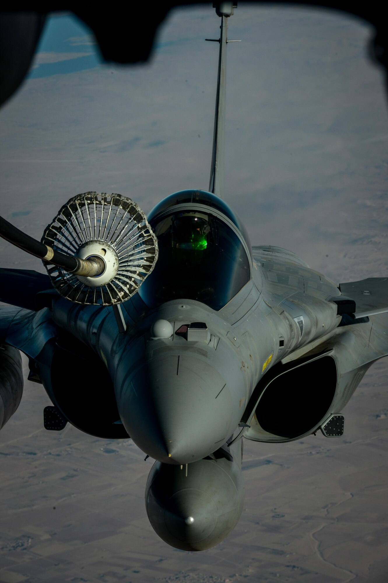 A French Naval Rafale receives fuel from a 908th Expeditionary Air Refueling Squadron KC-10 Extender during a flight in support of Operation Inherent Resolve June 2, 2017. Rafale is a French twin-engine, canard delta wing, multirole fighter aircraft with a wide range of weapons. The Rafale is intended to perform air supremacy, interdiction, aerial reconnaissance, ground support, in-depth strike and anti-ship strike missions. (U.S. Air Force photo by Staff Sgt. Michael Battles)