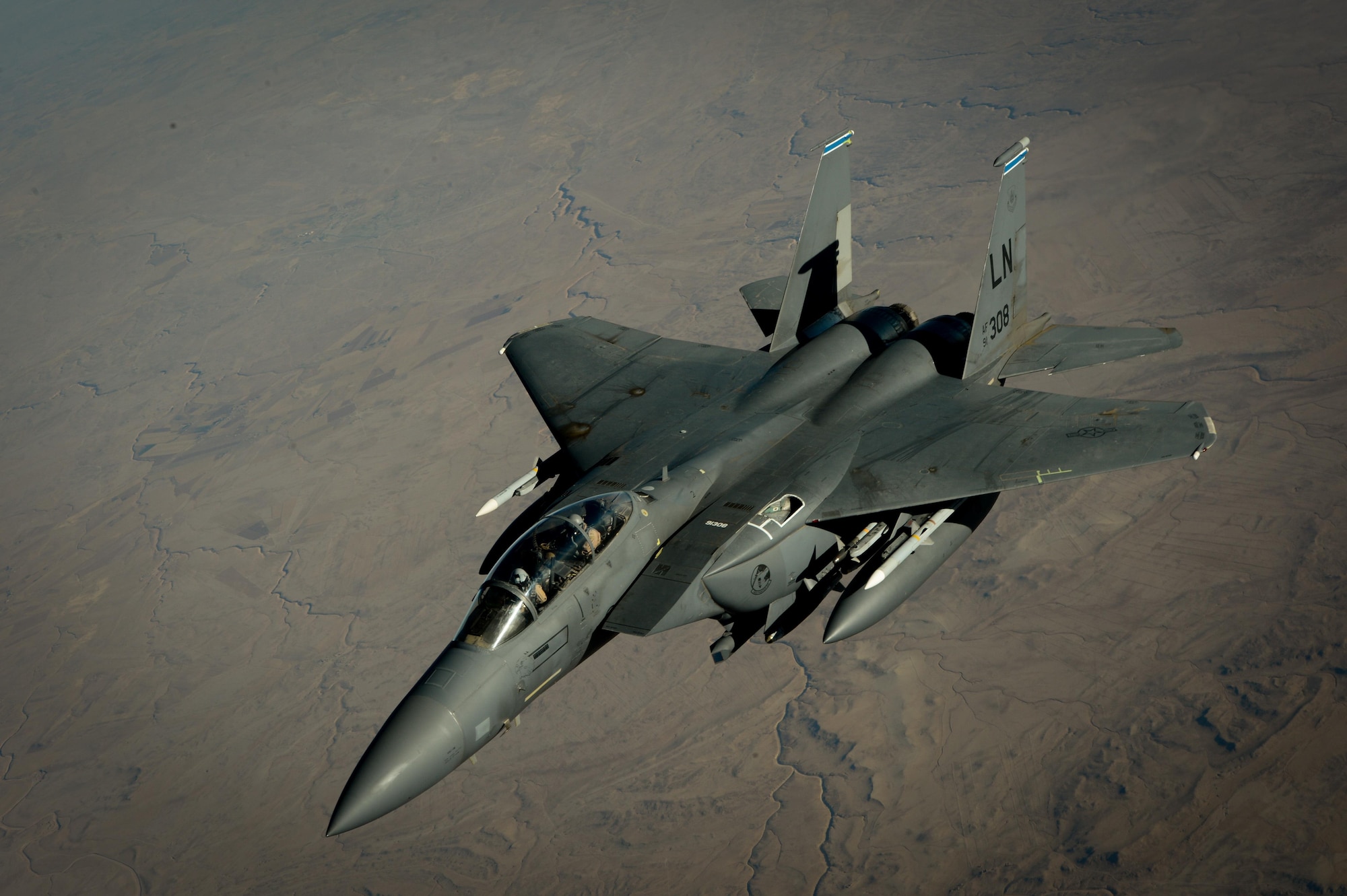 A U.S. Air Force F-15E Strike Eagle departs after receiving fuel from a 908th Expeditionary Air Refueling Squadron KC-10 Extender during a flight in support of Operation Inherent Resolve June 2, 2017. The F-15E Strike Eagle is a dual-role fighter designed to perform air-to-air and air-to-ground missions. An array of avionics and electronics systems gives the F-15E the capability to fight at low altitude, day or night, and in all weather. (U.S. Air Force photo by Staff Sgt. Michael Battles)