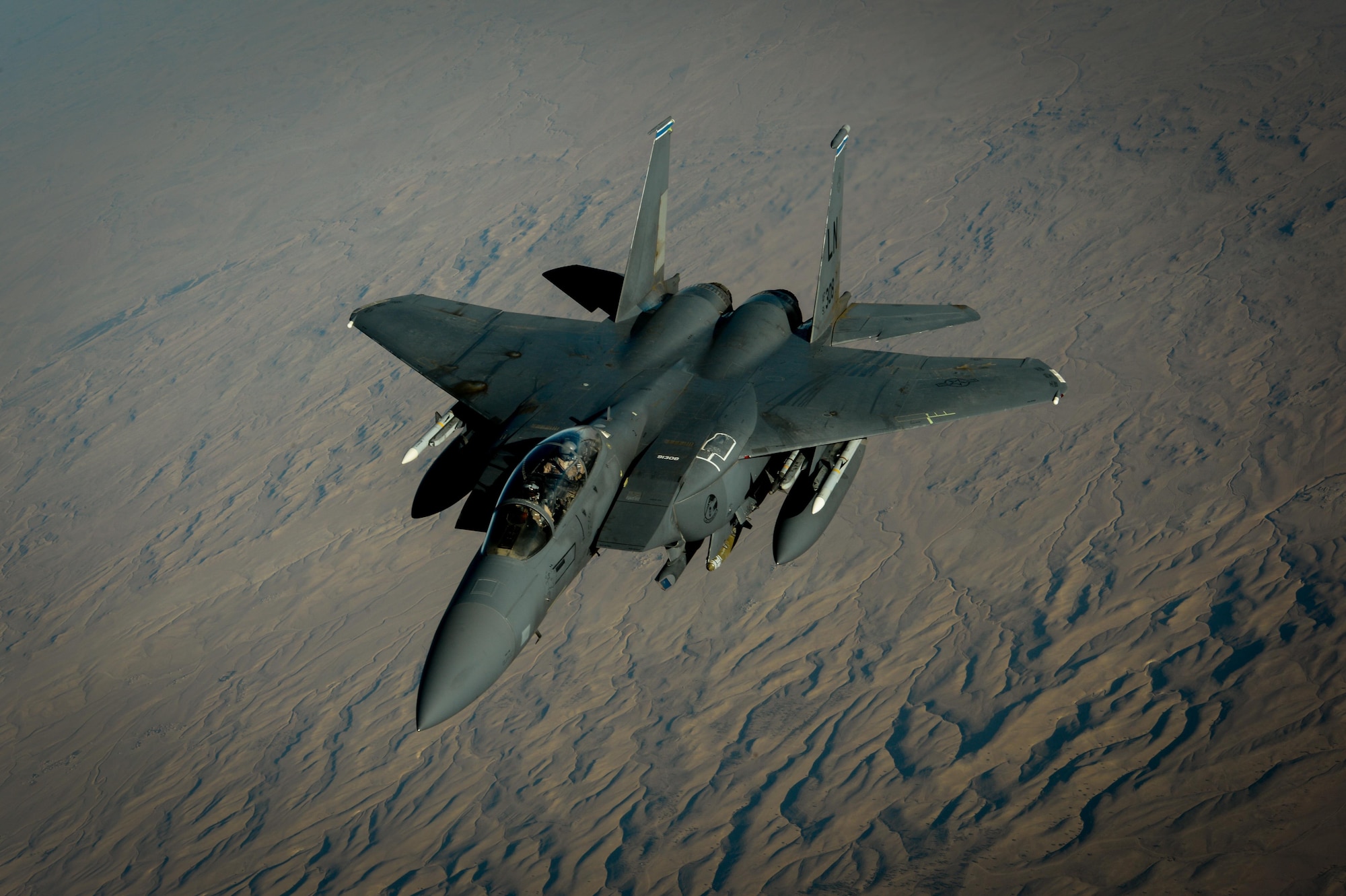 A U.S. Air Force F-15E Strike Eagle departs after receiving fuel from a 908th Expeditionary Air Refueling Squadron KC-10 Extender during a flight in support of Operation Inherent Resolve June 2, 2017. The F-15E Strike Eagle is a dual-role fighter designed to perform air-to-air and air-to-ground missions. An array of avionics and electronics systems gives the F-15E the capability to fight at low altitude, day or night, and in all weather. (U.S. Air Force photo by Staff Sgt. Michael Battles)