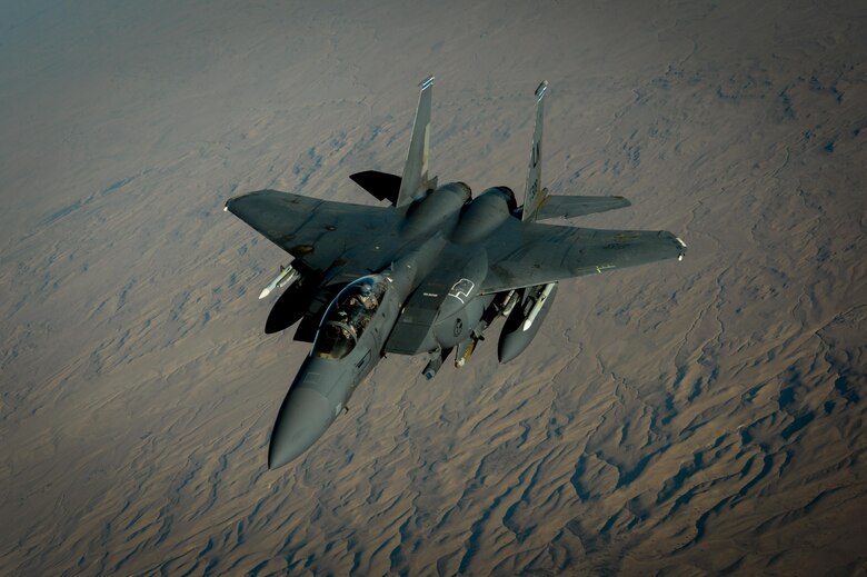 A U.S. Air Force F-15E Strike Eagle departs after receiving fuel from a 908th Expeditionary Air Refueling Squadron KC-10 Extender during a flight in support of Operation Inherent Resolve June 2, 2017. The F-15E Strike Eagle is a dual-role fighter designed to perform air-to-air and air-to-ground missions. An array of avionics and electronics systems gives the F-15E the capability to fight at low altitude, day or night, and in all weather. (U.S. Air Force photo by Staff Sgt. Michael Battles)