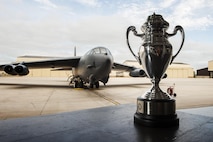 The Omaha Trophy stands in front of a B-52H Stratofortress at Minot Air Force Base, N.D., June 6, 2017. Gen. John E. Hyten, U.S. Strategic Command commander, presented the 5th Bomb Wing with the 2017 Omaha Trophy in the Strategic Bomber. (U.S. Air Force photo/Senior Airman J.T. Armstrong)
