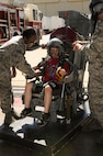 A child sits in an ejection seat during Operation Heroes at Minot Air Force Base, N.D., June 3, 2017. Operation Heroes is an annual event hosted by the 5th Force Support Squadron that allows military children to undergo a mock deployment to help them better understand what their parents experience abroad. (U.S. Air Force photos/Senior Airman Sahara L. Fales)