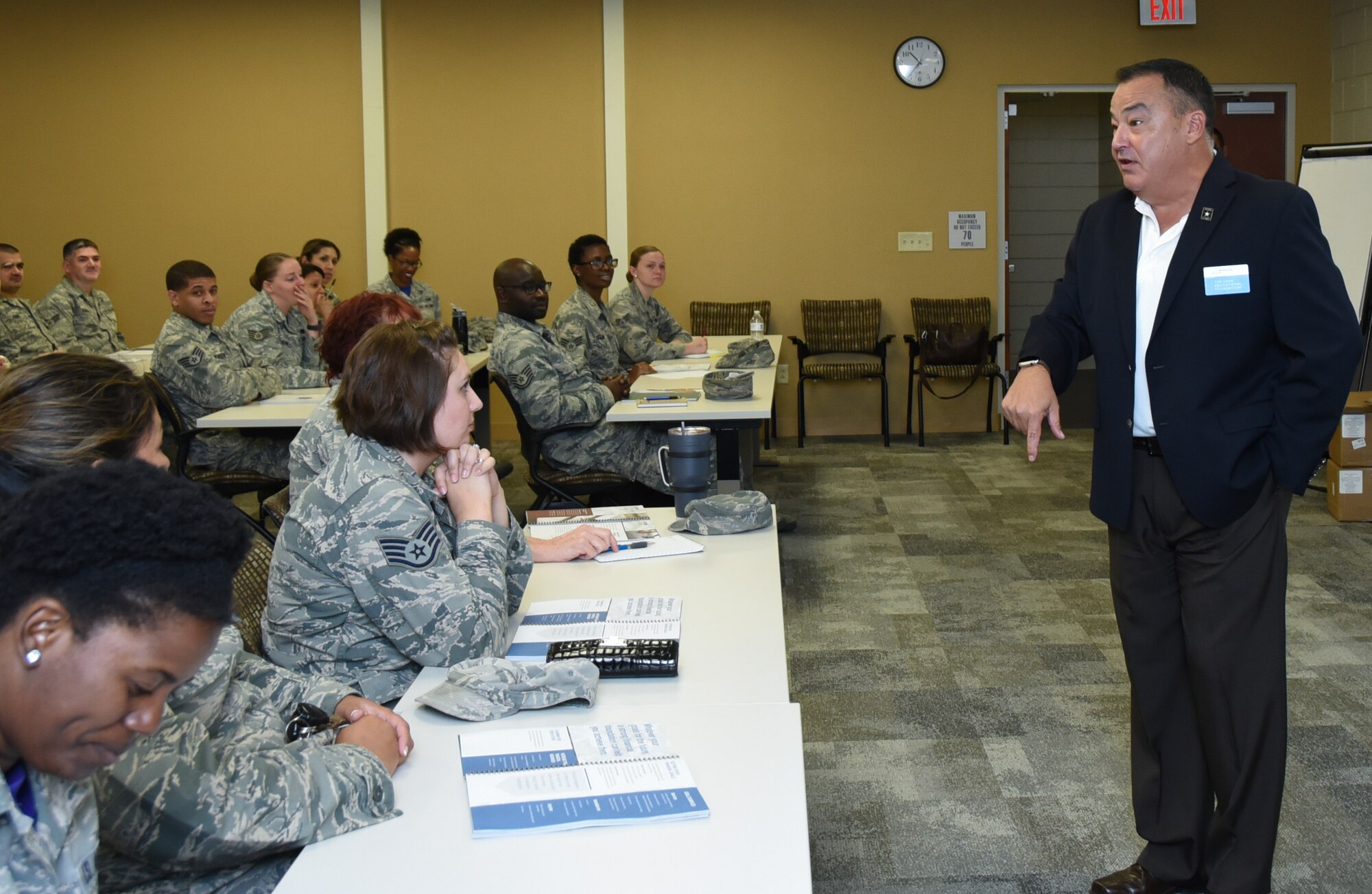NAVAL AIR STATION FORT WORTH JOINT RESERVE BASE, Texas -- Mr. Karl Morgan, from the USAA Educational Foundation, speaks to Airmen about managing their finances, including short and long-term investing, and how credit scores really work.  The class was presented by the 301st Fighter Wing Human Resources Development Council. (U.S. Air Force photo by Tech. Sgt. Melissa Harvey)