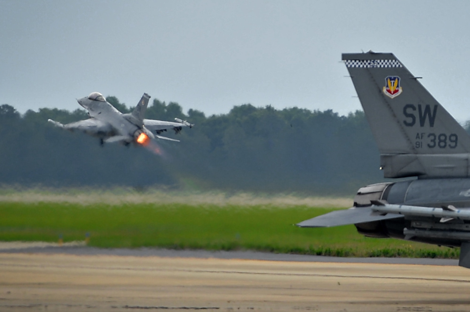 An F-16CM Fighting Falcon assigned to the 55th Fighter Squadron (FS) takes off from the flightline at Shaw Air Force Base, S.C., June 7, 2017. The 55th FS, also known as the “Shooters,” is one of three fighter squadrons assigned to the 20th Fighter Wing which have the capability to support the suppression of enemy air defenses mission.  (U.S. Air Force photo by Airman 1st Class Christopher Maldonado)