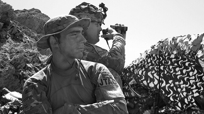 Second  Lt. Andrew Dane stands watch while deployed as a Tactical Air Control Party specialist. In recounting his experience as a TACP specialist, Dane said “I could still wear my beret and blouse my boots, I feel like (this) was fit for me.” (Courtesy photo)