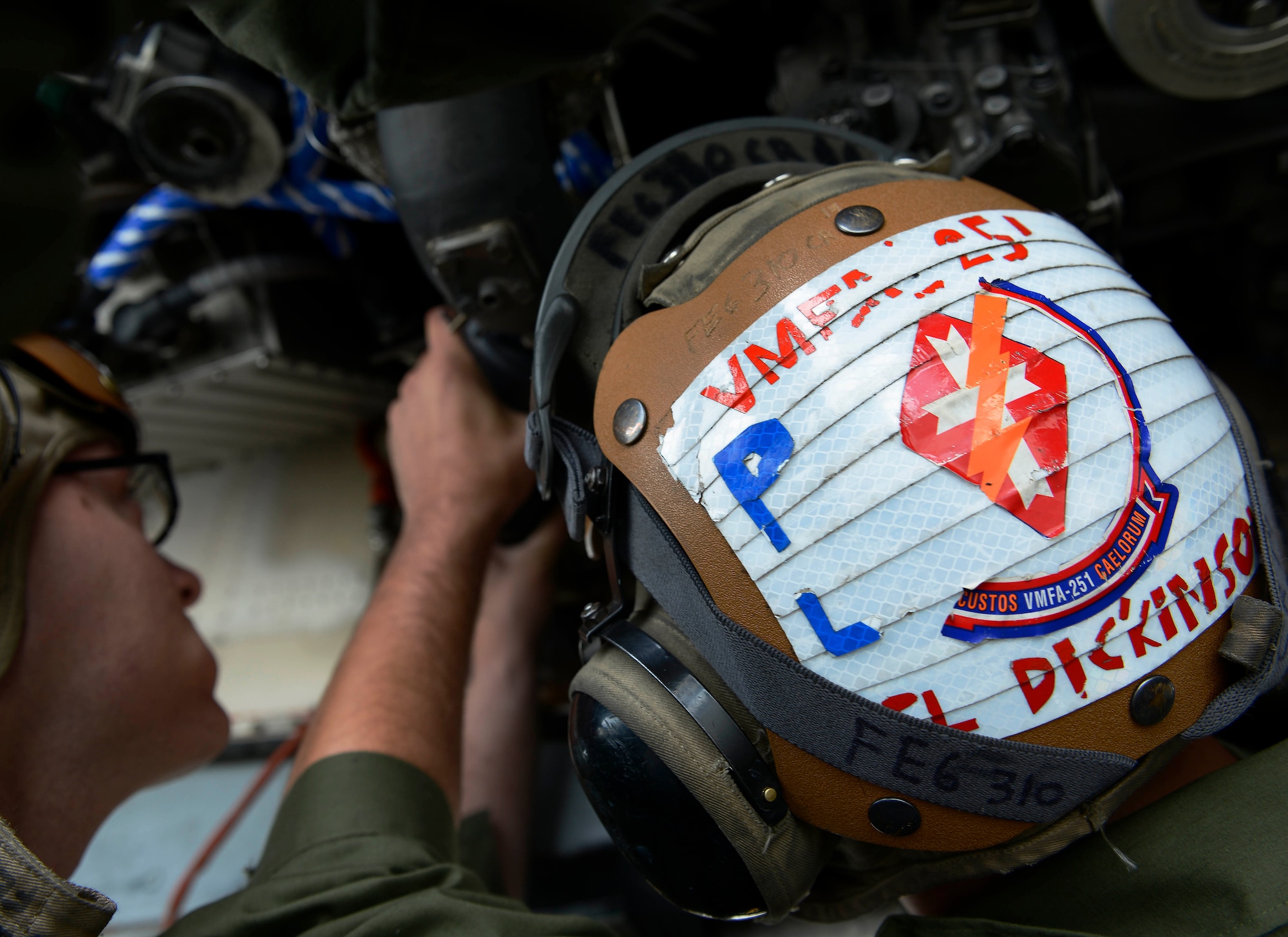 U.S. Marine Corps Cpl. Kyle Dickinson, maintainer with Marine Fighter Attack Squadron 251, helps install a new motor on a Marine Corps F/A-18D Hornet, at Joint Base Elmendorf-Richardson, Alaska, June 7, 2017. VMFA-251, based out of South Carolina, is here participating in a joint exercise. 