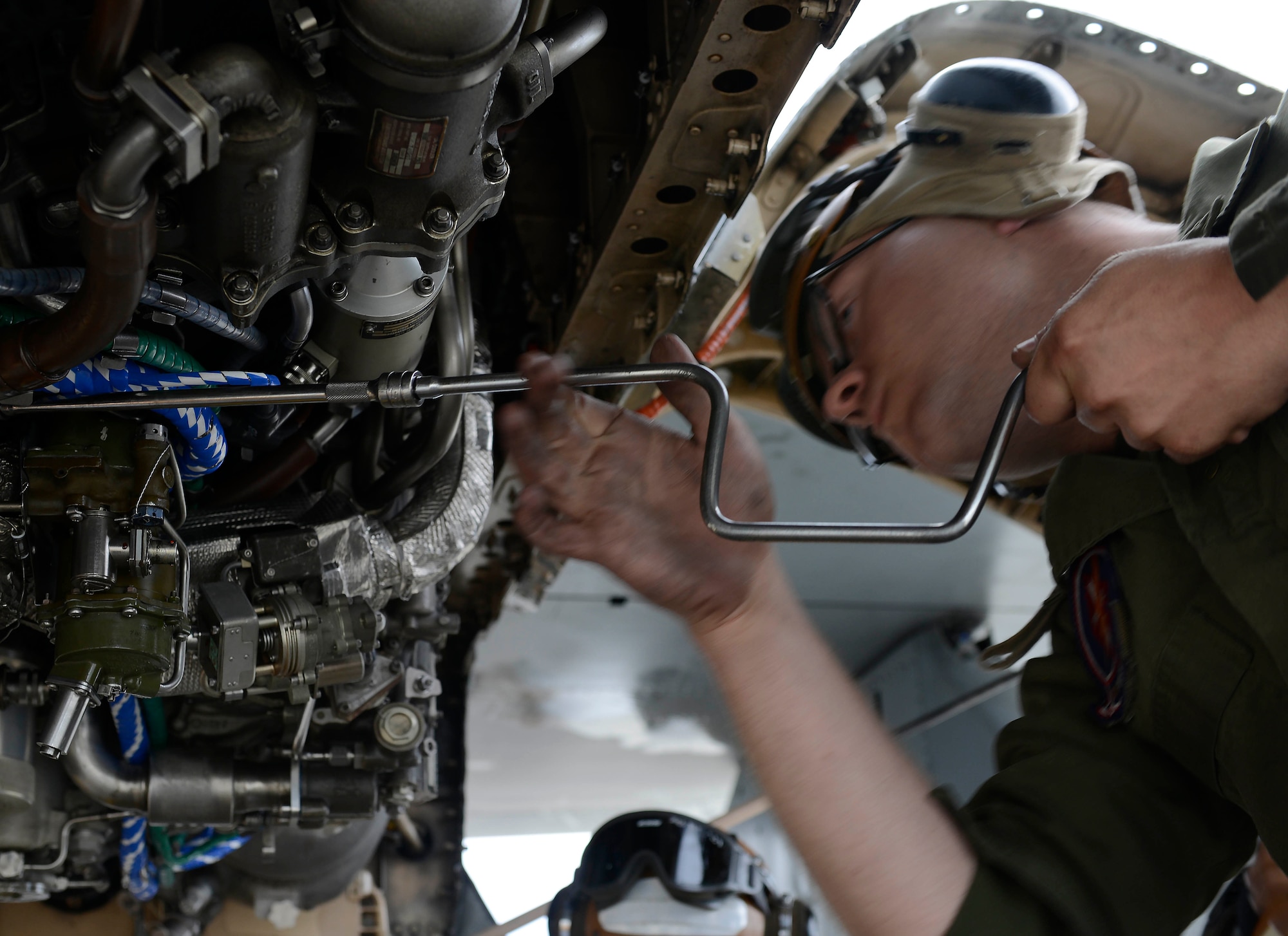 U.S. Marine Corps Cpl. Steven Montgomery, maintainer with Marine Fighter Attack Squadron 251, helps install a new motor on a Marine Corps F/A-18D Hornet, at Joint Base Elmendorf-Richardson, Alaska, June 7, 2017. VMFA-251, based out of South Carolina, is here participating in a joint exercise. 
