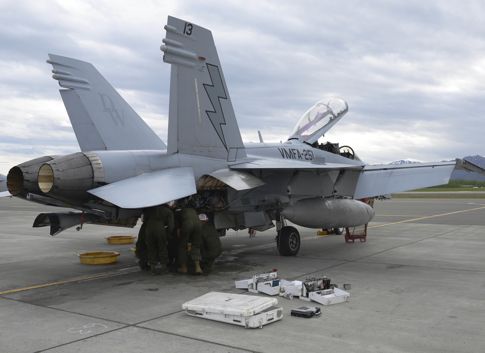 U.S. Marine Corps maintainers with Marine Fighter Attack Squadron 251 install a new motor on a Marine Corps F/A-18D Hornet, at Joint Base Elmendorf-Richardson, Alaska, June 7, 2017. VMFA-251, based out of South Carolina, is here participating in a joint exercise.