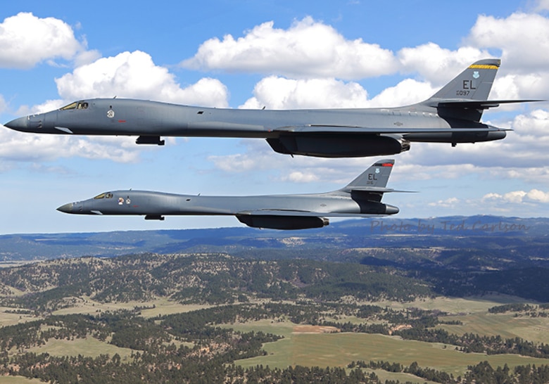 B-1B Lancers assigned to the 37th Bomb Squadron and 34th Bomb Squadron at Ellsworth Air Force Base, S.D., team up for a training mission April 12, 2017. This year marks the 100th anniversary of the squadrons whose heritage includes being two of the squadrons that participated in the historic Doolittle Raid in 1942. (Photo provided by Ted Carlson, Fotodynamics)