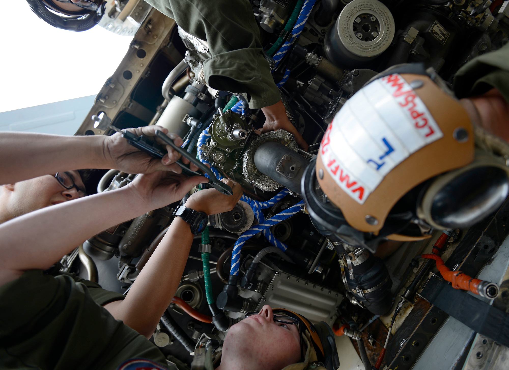 U.S. Marine Corps maintainers with Marine Fighter Attack Squadron 251 install a new motor on a Marine Corps F/A-18D Hornet, at Joint Base Elmendorf-Richardson, Alaska, June 7, 2017. VMFA-251, based out of South Carolina, is here participating in a joint exercise. 